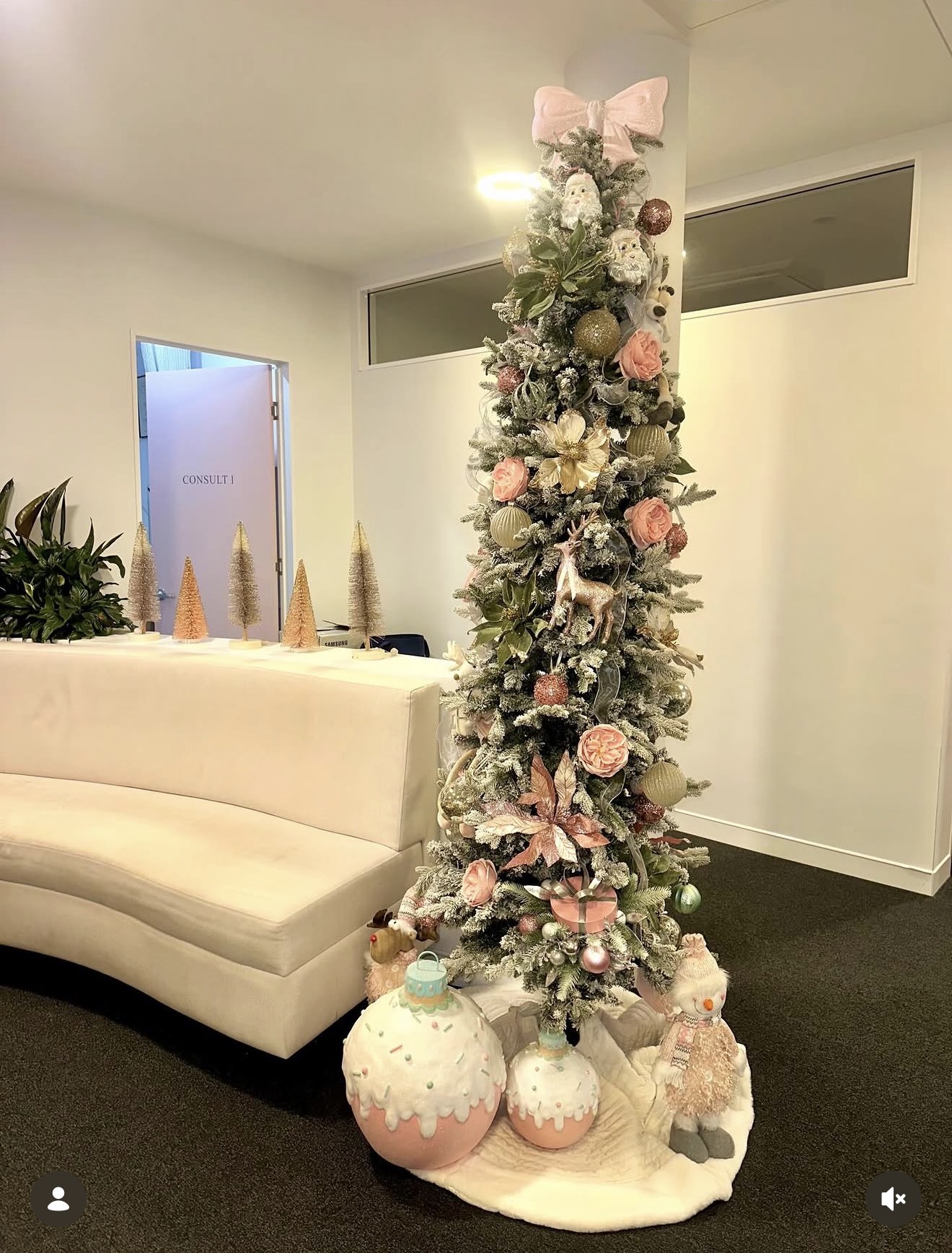 Pink and gold seasonal styling in a medical centre reception